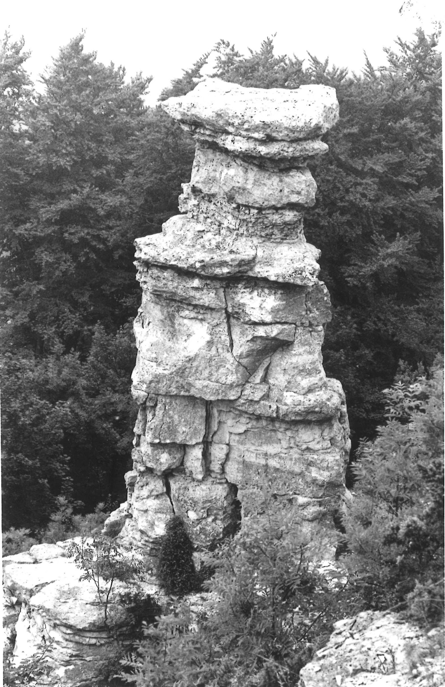 Image of The Devil’s Chimney from Gloucestershire Archives located on Leckhampton Hill in Cheltenham.