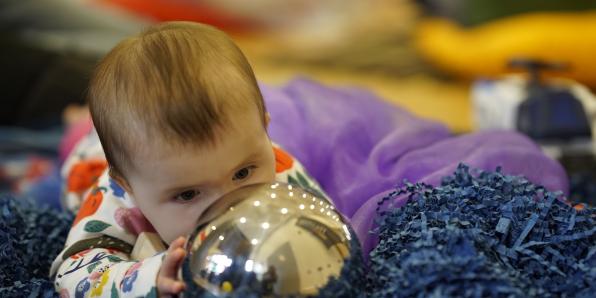 Baby with Sensory Toys