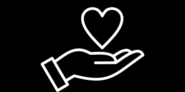 Image of an open hand holding a love heart symbol