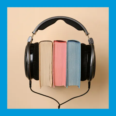 3 books with Headphones on.