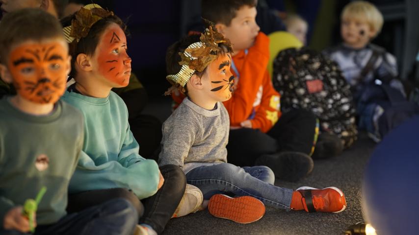 children watching a theatre show