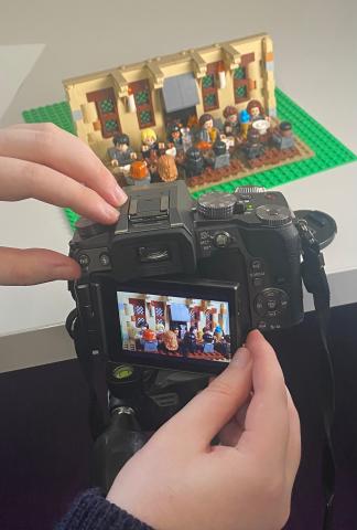 Close up of camera filming a Harry Potter themed Lego animation