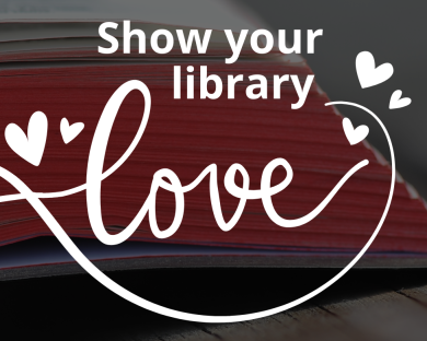 Photo of a book with its pages curled to form a heart, and the slogan "Show your library love"